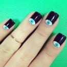 <div class="caption-credit"> Photo by: Via @RachelGalante Twitter</div><div class="caption-title">Evil Eye</div><p> This mani takes on both the half-moon trend and gives it a creepy-cool twist with the superstitious evil eye! </p> <p> <b>Nail It!</b> To get this design, you'll need black, white, and teal polish and a nail art pen. </p> <p> 1. First, paint two solid coats of white and let it dry completely. </p> <p> 2. Use a binder reinforcement sticker to cover the lower third of each nail, making sure to keep the curve centered! </p> <p> 3. Next paint two coats of the black polish on top, and wait for the polish to dry before you peel off the stickers. </p> <p> 4. Lastly, dab some teal polish in the center of the moon to create the eye, and finish it off using a dotting tool dipped in black for the pupil! </p> <p> <b>Related: <br></b> <a rel="nofollow noopener" href="http://www.seventeen.com/parties/quinceanera/perfect-quinceanera-pedicure?click=main_sr#slide-1?link=rel&dom=yah_life&src=syn&mag=svn" target="_blank" data-ylk="slk:Don't Forget About Your Toes!;elm:context_link;itc:0;sec:content-canvas" class="link "><b>Don't Forget About Your Toes!</b></a> <br> <b><a rel="nofollow noopener" href="http://www.seventeen.com/fun/quizzes/beauty/catching-fire-nail-art-quiz?link=rel&dom=yah_life&src=syn&mag=svn" target="_blank" data-ylk="slk:Want some Catching Fire nail inspiration? Find out which district you should rock for Halloween!;elm:context_link;itc:0;sec:content-canvas" class="link ">Want some <i>Catching Fire</i> nail inspiration? Find out which district you should rock for Halloween!</a></b> </p>