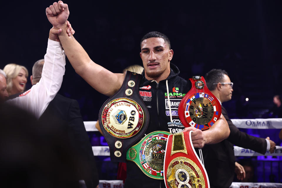 Seen here, Australian heavyweight Justis Huni celebrating his victory against Kiki Toa Leutele at Brisbane's Nissan Arena. 