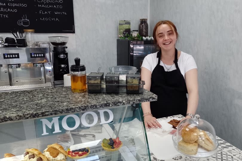 Mille Jackson, the owner of Buckinghams patisserie, behind the counter