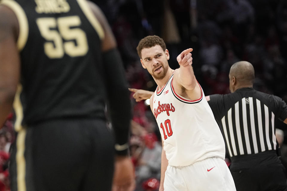 Ohio State forward Jamison Battle (10) celebrates after a 3-point basket in the second half of an NCAA college basketball game against Purdue, Sunday, Feb. 18, 2024, in Columbus, Ohio. (AP Photo/Sue Ogrocki)