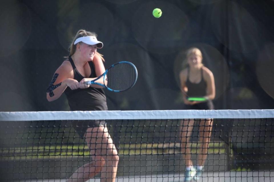 Senior Hallie Lathram and seventh grader Callie Cranfill of Lexington Catholic competed as a doubles pair for the first time in the 11th Region Tournament — and won it all.