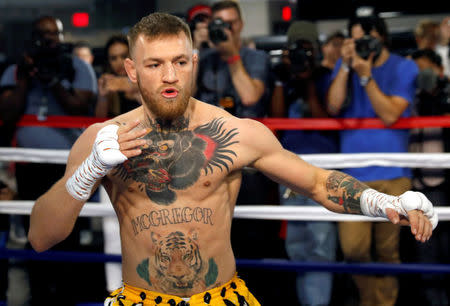 Conor McGregor of Ireland warms up in a boxing ring during a workout at the UFC Performance Center in Las Vegas, Nevada, U.S., August 11, 2017. REUTERS/Steve Marcus