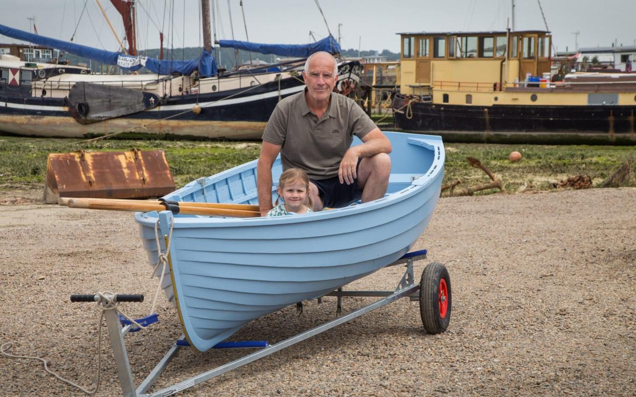 Messing about on the river: Gornall and his daughter Phoebe have enjoyed going out in the boat he built - Tony Buckingham