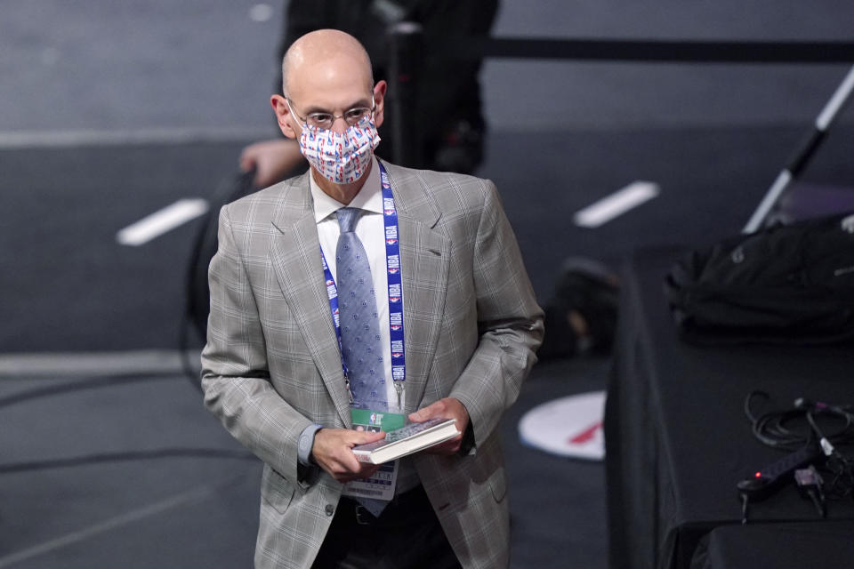 NBA Commissioner Adam Silver attends Game 2 of basketball's NBA Finals between the Los Angeles Lakers and the Miami Heat on Friday, Oct. 2, 2020, in Lake Buena Vista, Fla. (AP Photo/Mark J. Terrill)