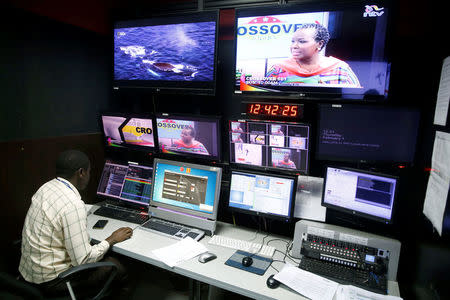 A man sits in a control centre of the NTV channel, which was shutdown by the Kenyan government because of their coverage of opposition leader Raila Odinga's symbolic presidential inauguration this week, at the Nation group media building In Nairobi, Kenya, February 1, 2018. REUTERS/Baz Ratner