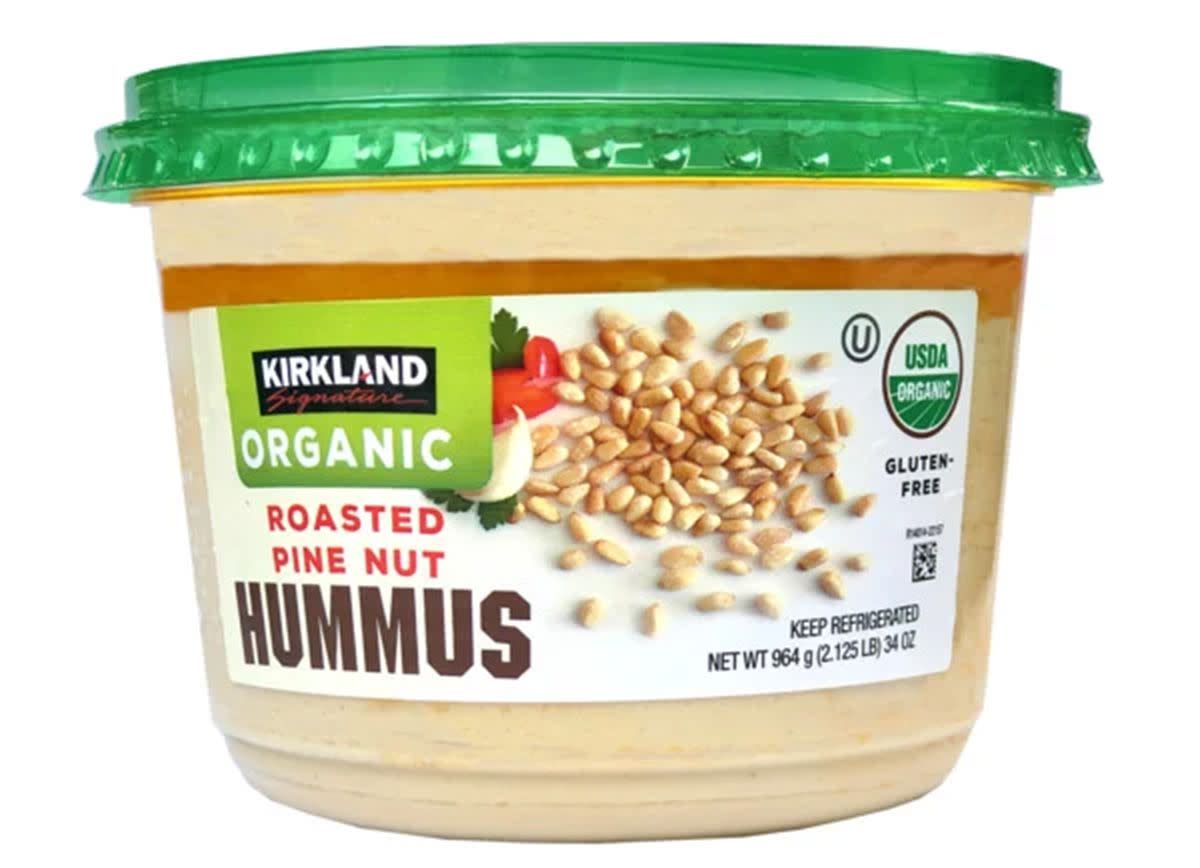 A package of Kirkland Signature Organic Roasted Pine Nut Hummus against a white background