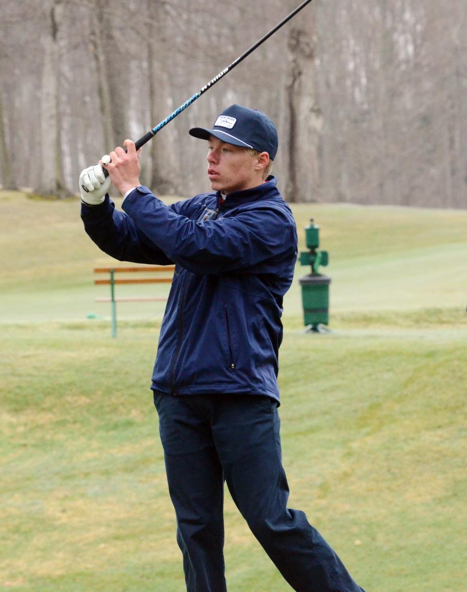 Boyne City golfer Kolton Stadt follows his shot during the Petoskey Invite Monday.