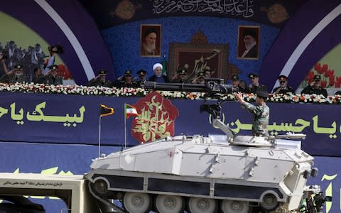 Iranian President Hassan Rouhani is seen during the ceremony of the National Army Day parade in Tehran - Credit: Wana News Agency&nbsp;