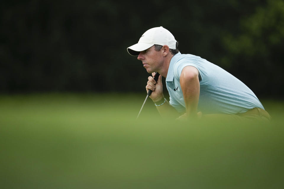 Rory McIlroy, of Northern Ireland, lines up a putt on the 10th hole during the first round of the Masters golf tournament at Augusta National Golf Club on Thursday, April 6, 2023, in Augusta, Ga. (AP Photo/Matt Slocum)