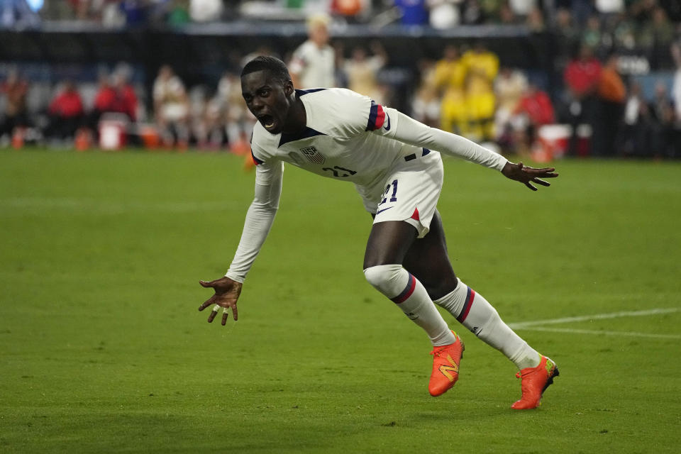 CORRECTS THAT CHRISTIAN PULISIC SCORED THE GOAL, INSTEAD OF WEAH - United States' Timothy Weah celebrates a goal by Christian Pulisic against Mexico during the second half of a CONCACAF Nations League semifinal soccer match Thursday, June 15, 2023, in Las Vegas. (AP Photo/John Locher)