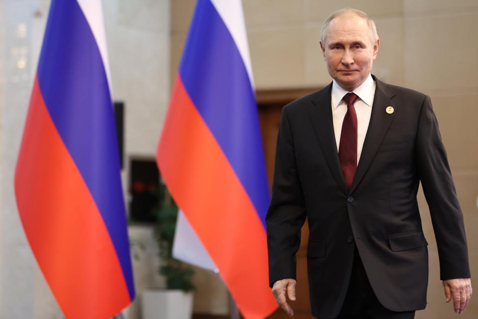 Russian President Vladimir Putin arrives at his news conference after the Summit of the Intergovernmental Council of the Eurasian Economic Union (EAEU) in Bishkek, Kyrgyzstan, Friday, Dec. 9, 2022. (Sergei Bobylev, Sputnik, Kremlin Pool Photo via AP)