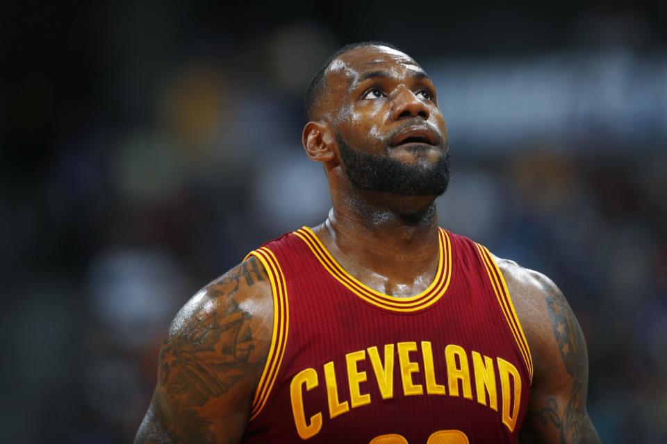 LeBron James looks for some stops. He does not see any. (AP)