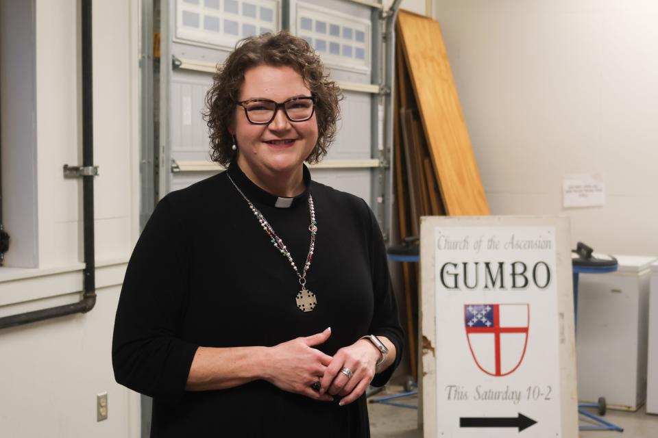 Rev. Jenny Newman, rector of The Episcopal Church of the Ascension, stands in front of a sign stored in the gumbo storage room at the Hattiesburg on Thursday, Jan. 25, 2024. Ascension's Ministry of the Pots makes gumbo twice a year, selling about 2,000 quarts a year with proceeds benefiting church outreach programs.