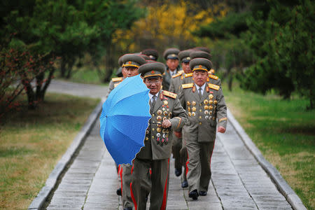 Military officers visit the birthplace of North Korean founder Kim Il Sung, a day before the 105th anniversary of his birth, in Mangyongdae, just outside Pyongyang, North Korea April 14, 2017. REUTERS/Damir Sagolj