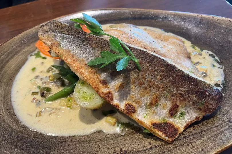 Sea bass with capers, brown butter and lemon with a warm new potato and green bean salad -Credit:BristolLive