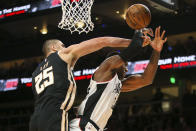 Atlanta Hawks center Alex Len (25) fouls Los Angeles Clippers forward Patrick Patterson (54) in the first half of an NBA basketball game Wednesday, Jan. 22, 2020, in Atlanta, Ga. (AP Photo/Brett Davis)