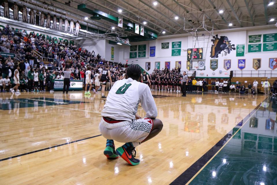 Washington's Terrence Reid (0) reacts after missing a shot late in the 4th quarter during the IHSAA Regional Finals Saturday, Mar. 11, 2023 at Washington High School.