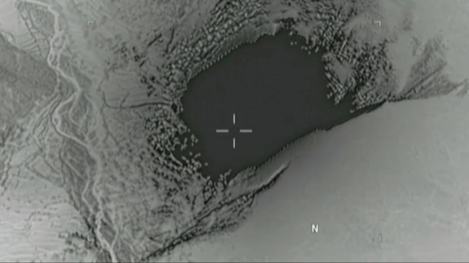 An image taken from a video released by the Department of Defense shows the moment a MOAB struck the Achin district Nangarhar province in Afghanistan, where U.S. officials said a network of tunnels and caves was being used by militants linked to the Islamic State group. (U.S. Department of Defense/handout via Reuters)