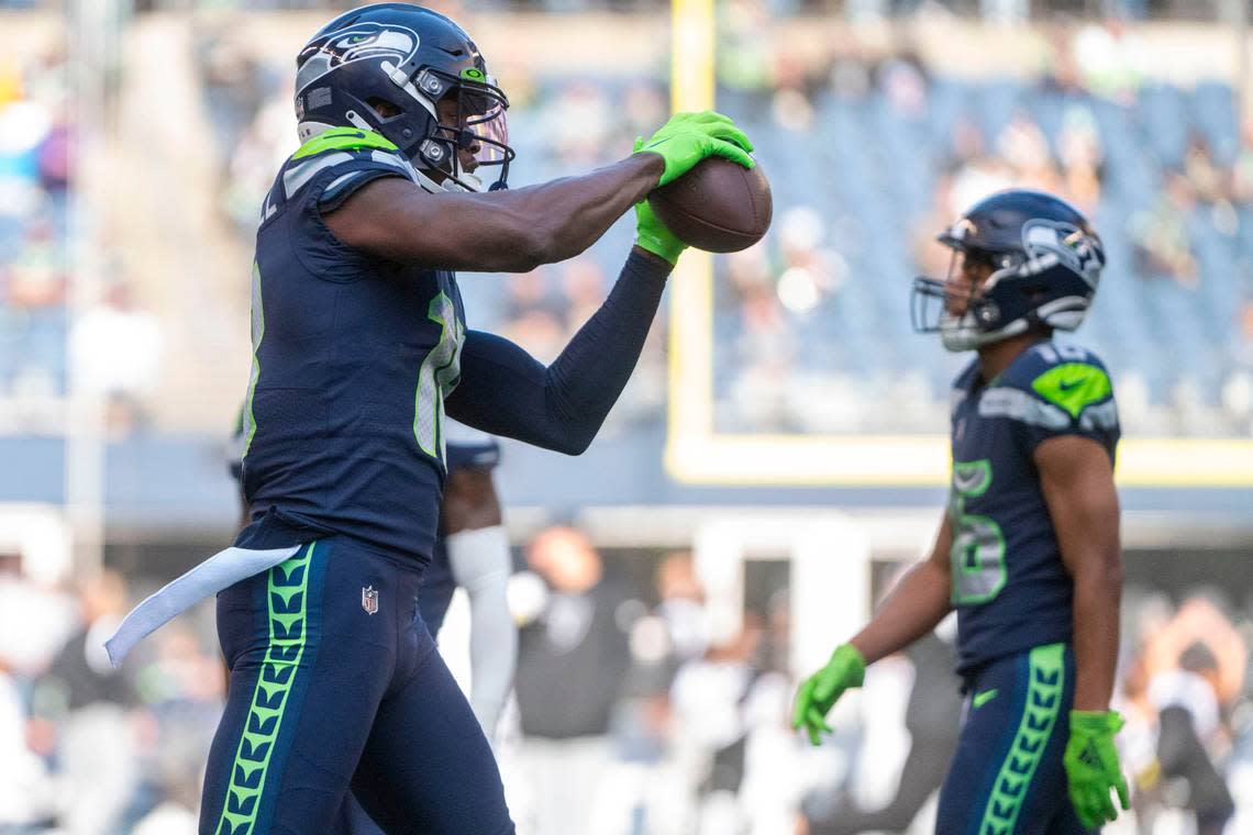 Seattle Seahawks wide receiver Laquon Treadwell (18) catches a pass during warms up prior to the start of an NFL game against against the Las Vegas Raiders on Sunday, Nov. 27, 2022, at Lumen Field in Seattle.