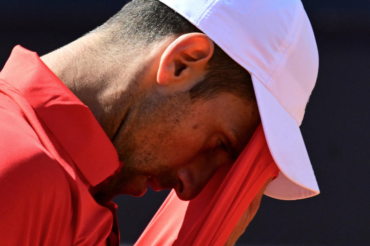 Serbia's Novak Djokovic reacts during his match against Chile's Alejandro Tabilo at the Rome Open at Foro Italico in Rome on May 12, 2024. (Photo by TIZIANA FABI/AFP via Getty Images)