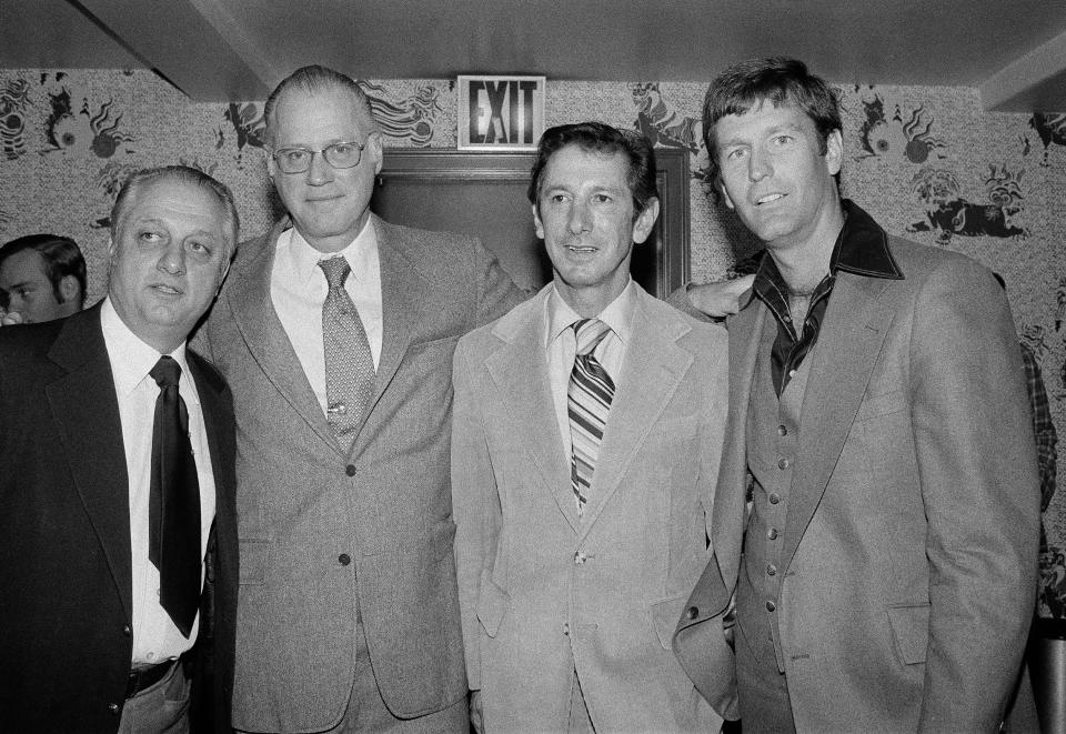 From left, Los Angeles Dodger manager Tom Lasorda, baseball commissioner Bowie Kuhn, New York Yankees manager Billy Martin, and Dodgers pitcher Tommy John meet the press in New York, Oct. 12, 1977, before Game 2 of the 1977 World Series.