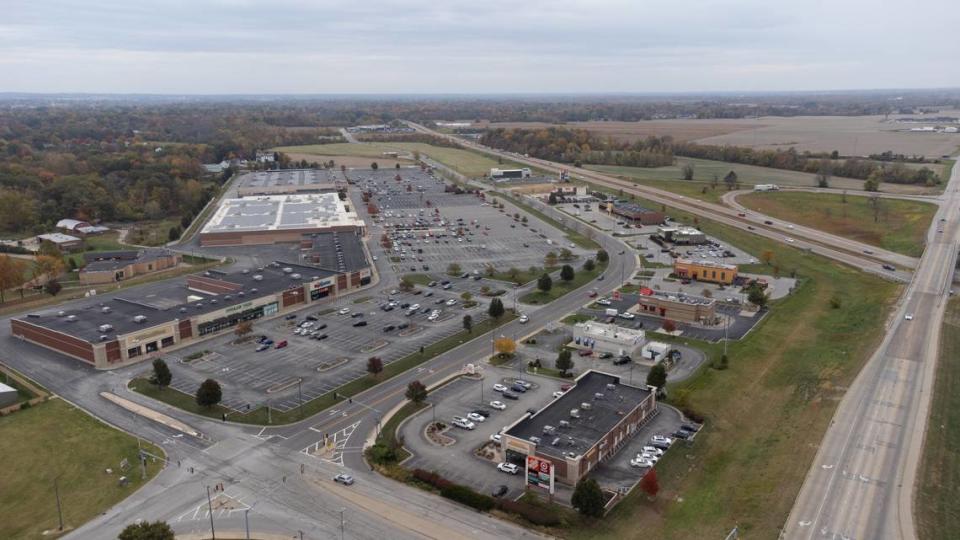 This file photo, taken with a drone in November 2023, shows Belleville Crossing shopping center, which includes a main strip mall and outlots with small strip malls and freestanding businesses.