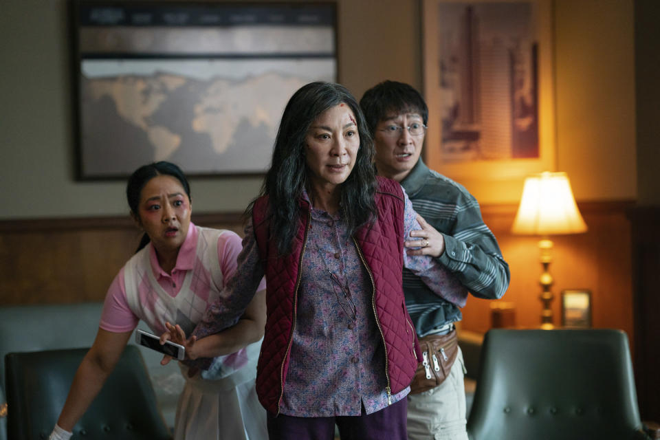 This image released by A24 Films shows, from left, Stephanie Hsu, Michelle Yeoh and Ke Huy Quan in a scene from, "Everything Everywhere All At Once." (Allyson Riggs/A24 Films via AP)