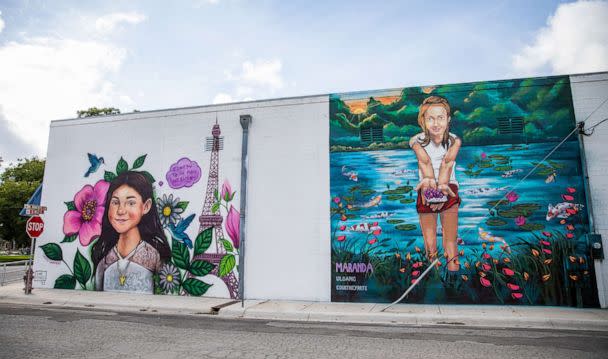 PHOTO: Murals honoring Jackie Cazares, left, and Maranda Mathis, right, fill the wall of a building in downtown Uvalde, Texas, Aug. 21, 2022. (Kat Caulderwood/ABC News)