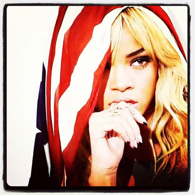 Celebrity photos: Rihanna is the queen of Twitpics and this one was no exception. The singer tweeted this striking image of her with the American flag draped across her head. Stunning. [Copyright: Rihanna]