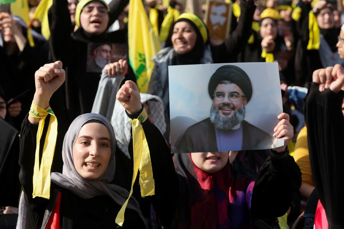 Hezbollah supporters gather to hear Hassan Nasrallah speak (REUTERS)