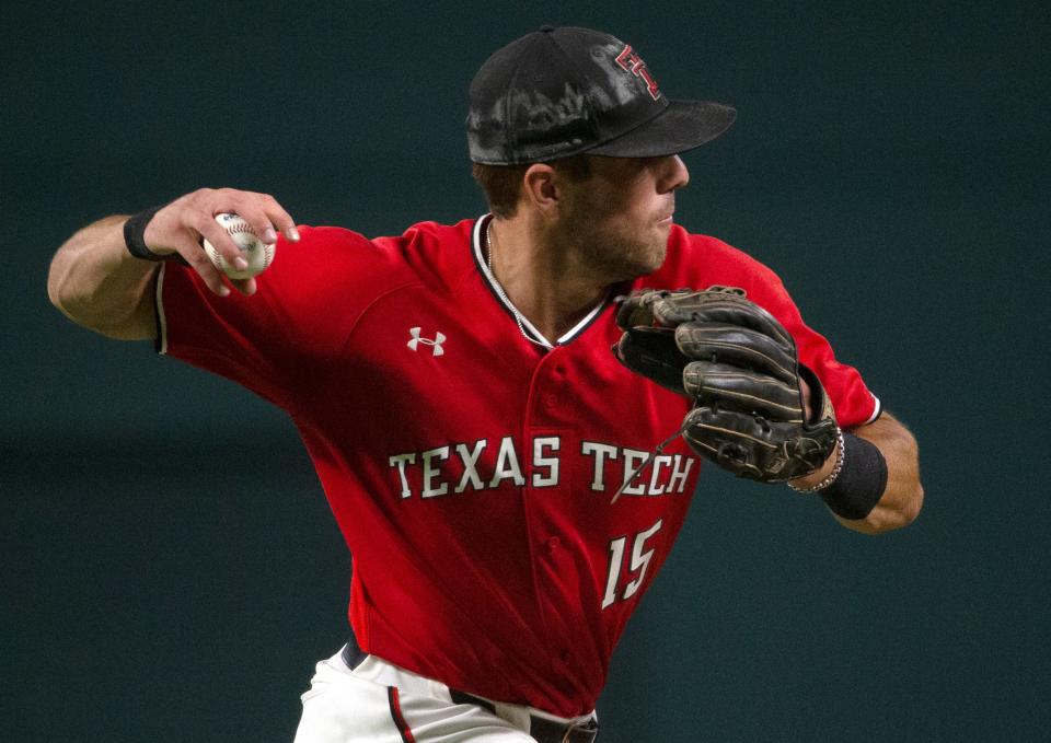 Texas Tech's infielder Parker Kelly (15) prepares to throw to first base against Oklahoma in the second-round Big 12 tournament game, Thursday, May 26, 2022, at Globe Life Field in Arlington. Oklahoma won, 6-3.