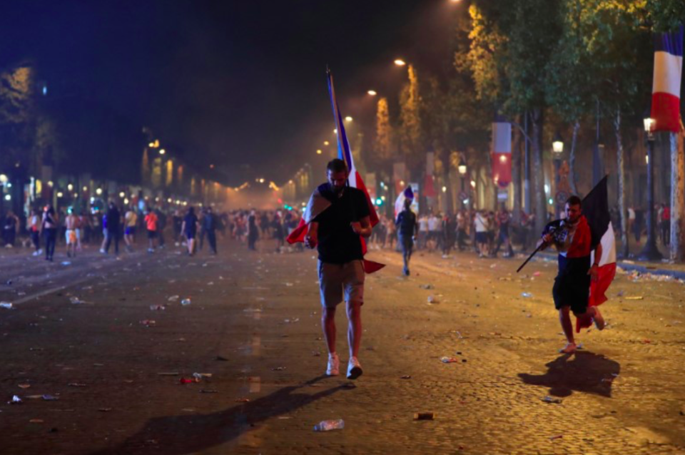 <em>Cars and wheelie bins were set on fire during the celebrations (Reuters)</em>