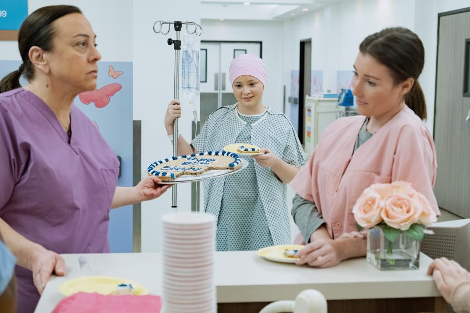 Young Joanna (Sophie Pollono), who battled leukemia as a teen, nabs a nurse's birthday cake by leaning into her diagnosis.