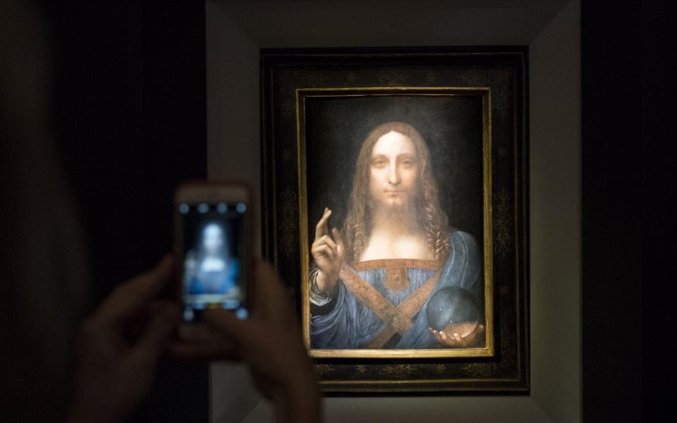 Leonardo's original Salvator Mundi before its sale at Christie's in New York - Getty