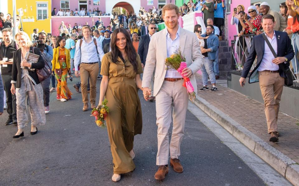 Prince Harry and Meghan, Duchess of Sussex, attend public holiday celebrations in Cape Town during their tour of South Africa in 2019 - Pool/Samir Hussein/Getty Images