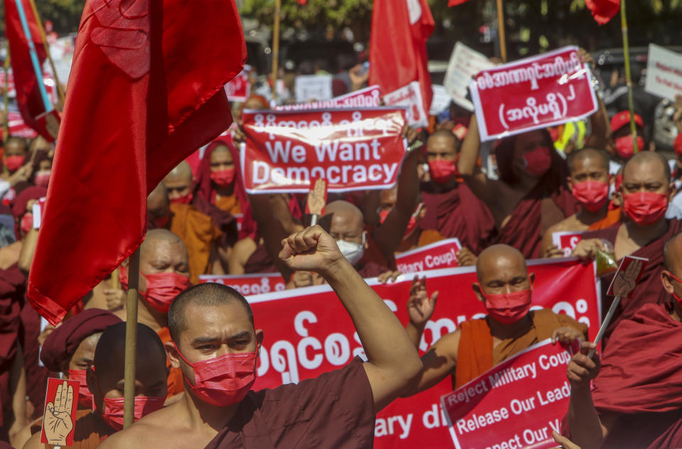 Buddhist monks lead a protest march against the military coup in Mandalay, Myanmar on Wednesday, Feb. 10, 2021. Protesters continued to gather Wednesday morning in Mandalay breaching Myanmar's new military rulers' decrees that effectively banned peaceful public protests in the country's two biggest cities. (AP Photo)