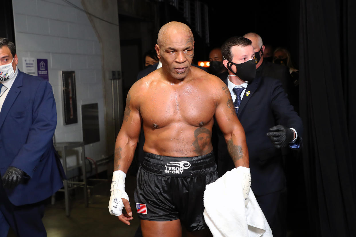 LOS ANGELES, CALIFORNIA - NOVEMBER 28: Mike Tyson exits the ring after receiving a split draw against Roy Jones Jr. during Mike Tyson vs Roy Jones Jr. presented by Triller at Staples Center on November 28, 2020 in Los Angeles, California. (Photo by Joe Scarnici/Getty Images for Triller)