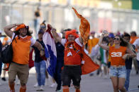 Fans storm the track after Red Bull driver Max Verstappen won the Formula One U.S. Grand Prix auto race at the Circuit of the Americas, Sunday, Oct. 24, 2021, in Austin, Texas. (AP Photo/Eric Gay)