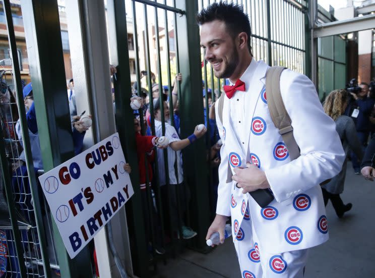 Kris Bryant spent some time on his road trip attire. (AP Photo)