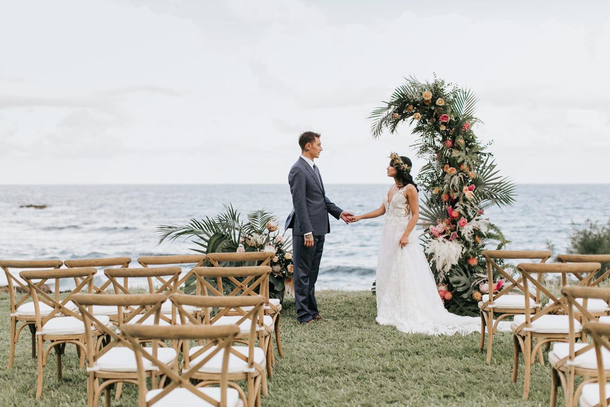 A couple celebrates their wedding at Hāna-Maui Resort on the island of Maui in Hawaii.