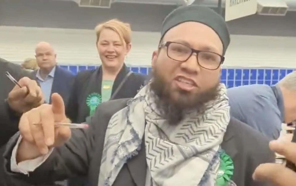 Supporters of successful Green party candidate Mothin Ali unfurled a Palestinian flag as the results were counted, shouting "we will not be silenced"