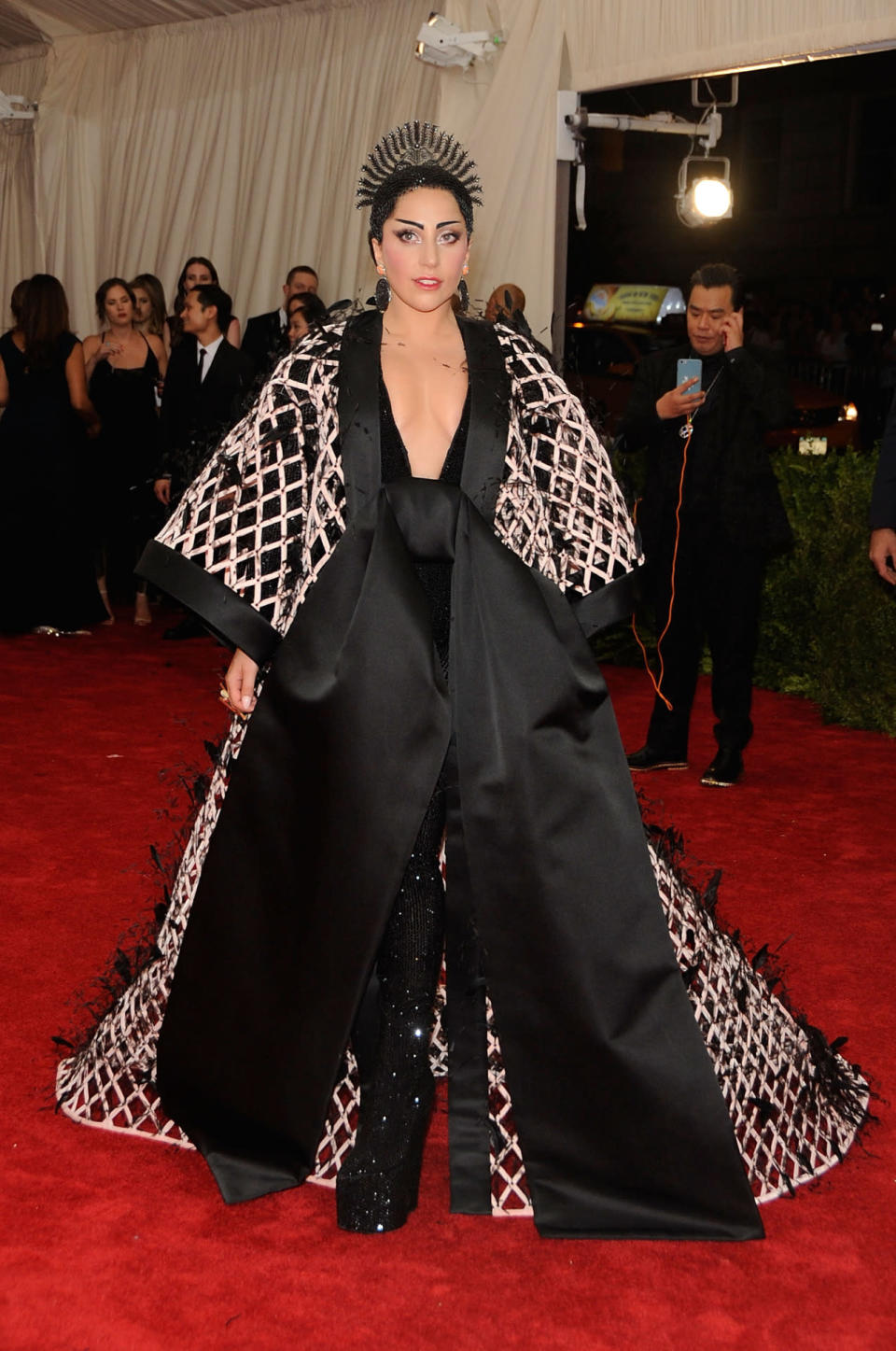 <p>At the ball honoring the Costume Institute’s “China: Through The Looking Glass” exhibition, Gaga walked the red carpet with her dress’ designer, Alexander Wang. <i>Photo: Getty Images </i></p>
