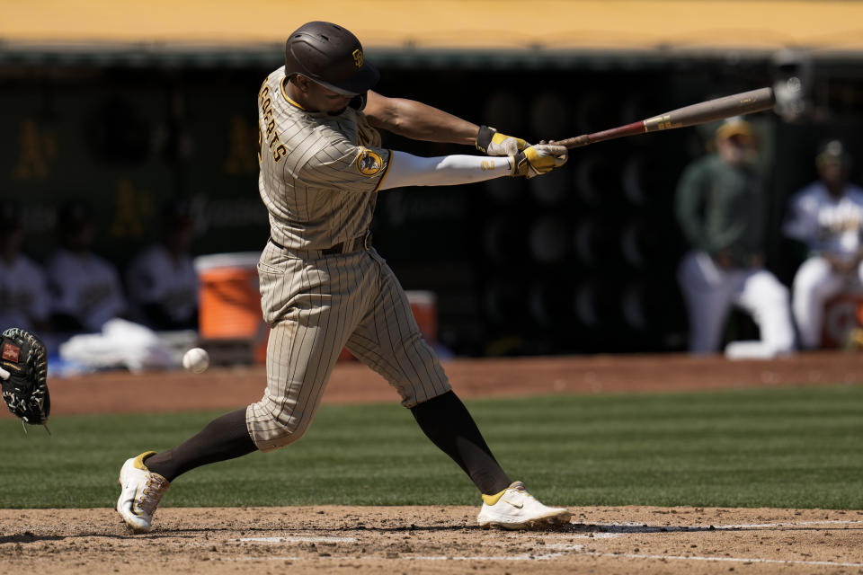 San Diego Padres' Xander Bogaerts strikes out against the Oakland Athletics during the fourth inning of a baseball game, Saturday, Sept. 16, 2023, in Oakland, Calif. (AP Photo/Godofredo A. Vásquez)