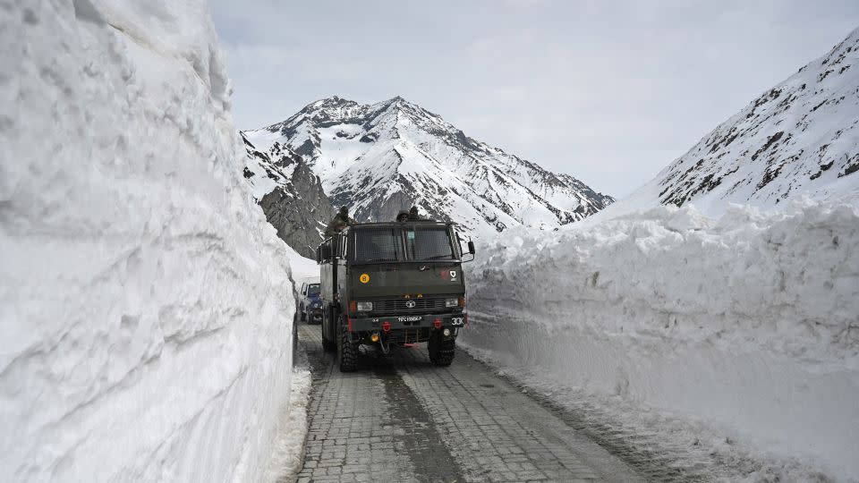 An Indian Army vehicle passes through the Zoji La mountain pass along a highway connecting Jammu and Kashmir to Ladakh. - Waseem Andrabi/Hindustan Times/Getty Images