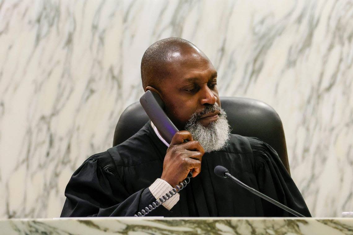 Miami-Dade Circuit Judge Orlando Prescott talks on the phone inside courtroom 11-4 at the Miami-Dade Children’s Courthouse in downtown Miami on Monday, February 13, 2023.