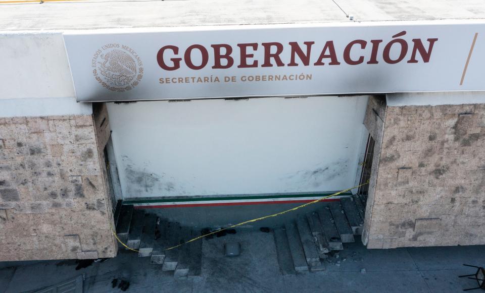 Diego Suy Guarchaj was pulled from this Mexican migrants facility in Juarez, where 40 migrants died on March 27, 2023. A white wall is stained with soot as firefighters and soldiers pulled migrants from the blaze. Twenty-eight people survived.