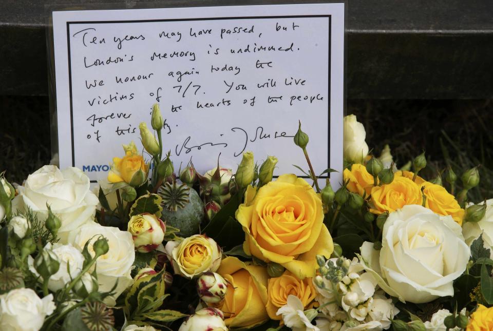 A message of condolence is seen on the wreath lain by London Mayor Boris Johnson at the memorial to victims of the July 7, 2005 London bombings, in Hyde Park, central London, Britain July 7, 2015. Britain fell silent on Tuesday to commemorate the 10th anniversary of attacks targeting London public transport which killed 56 people, the first suicide bombings by Islamist militants in western Europe. (REUTERS/Peter Nicholls)