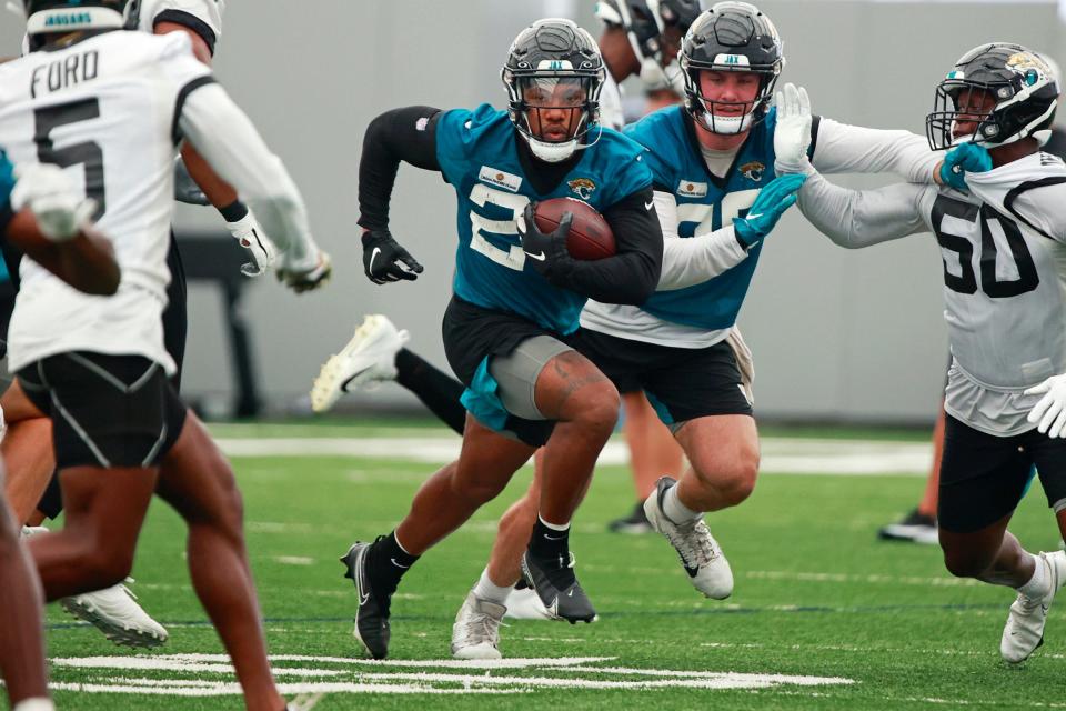 Jaguars running back Snoop Conner (24) participates in offseason training on May 31.