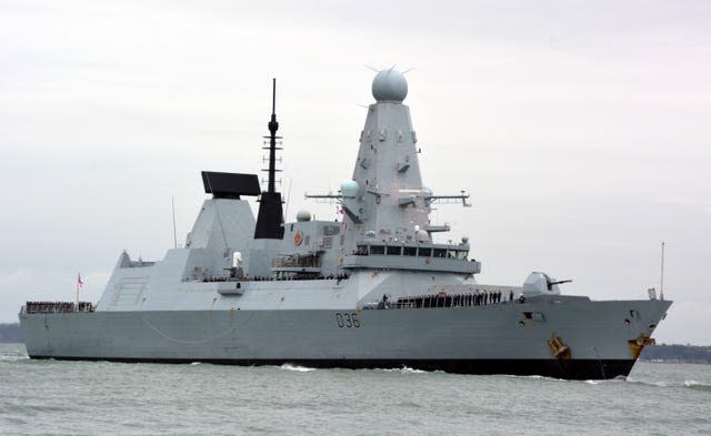 Russian forces fire warning shots at Royal Navy destroyer