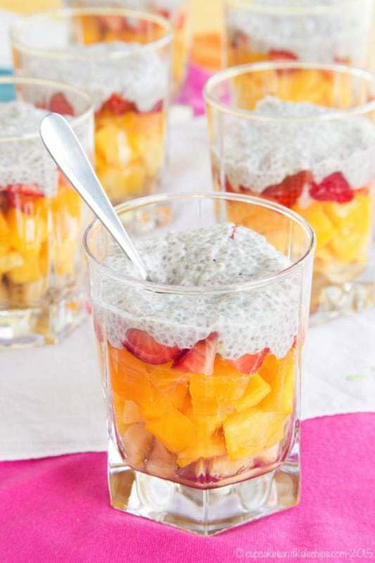 <p>Cupcakes & Kale Chips</p><p>Layers of tropical fruits and a creamy coconut chia topping make this a fun, pretty, and healthy fruit salad.</p><p><strong>Get the recipe: <a href="https://cupcakesandkalechips.com/tropical-fruit-salad/" rel="nofollow noopener" target="_blank" data-ylk="slk:Tropical Fruit Salad;elm:context_link;itc:0;sec:content-canvas" class="link ">Tropical Fruit Salad</a></strong></p>